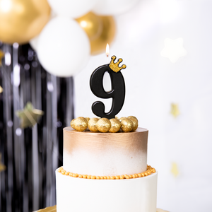 Black candle with golden crown number 9